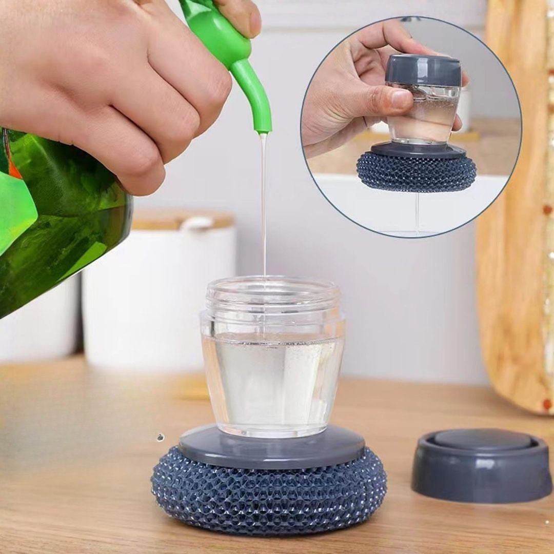 Refilling the transparent soap chamber and pressing the soap dispenser